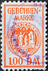 Germany - Circa 1970 A postale stamp from Germany showing the coat of arms of the University of...