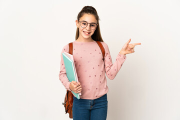 Little student girl over isolated background pointing finger to the side