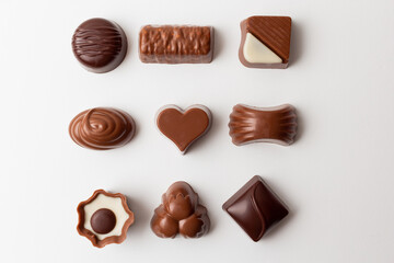 Chocolates with heart shape isolated on white background.