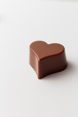 Chocolate heart shape isolated on white background.