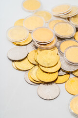 Materialized virtual currency on a monochrome background