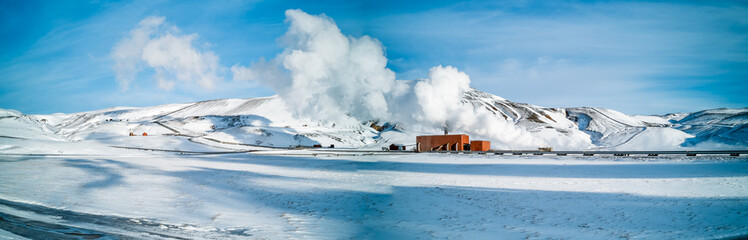 Geothermic energy plant over the snow, panorama