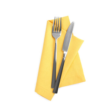 Yellow Napkin With Fork And Knife On White Background, Top View