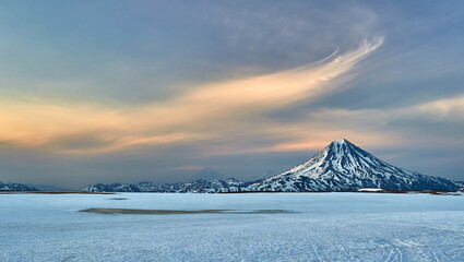 Volcano peak at sunset. Kamchatka, Russia. Travel and tourism