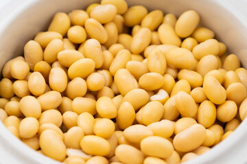 Soybeans with water on a pure white background
