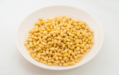 Soybeans with water on a pure white background