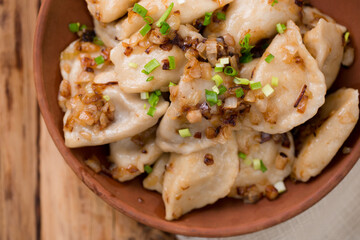 Ukrainian dumplings with fried bacon Top view