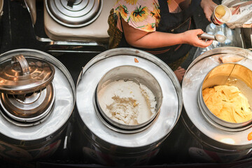 Top view of a street vendor selling thai coconut icecream or Itim Kati which is a popular summer treat