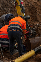 Repairing water pipes.
Workers attending to the city water supply repairs.
