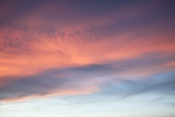 Emotional colorful sky after sunset. A magical nature of light phenomenon in evening sky background.	
