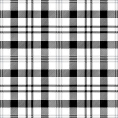 Black and white tartan plaid. Scottish pattern fabric swatch close-up.