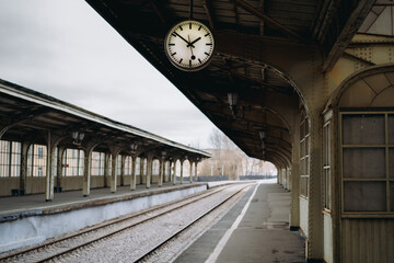 Exterior of the Vitebsky railway station. Vintage clock at the main platform