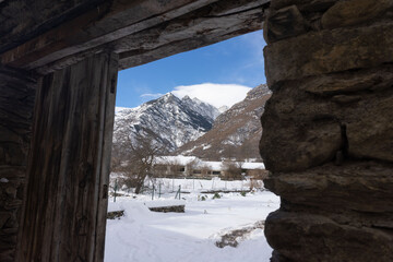 Fototapeta na wymiar completely snowy road in a valley of the Aragonese Pyrenees