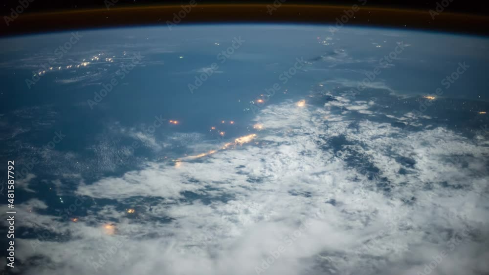 Wall mural flight over the earth's surface, made from a space station. 3d rendering
