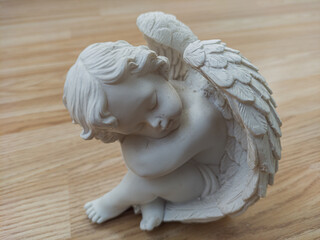 small white angel with wings  figurine