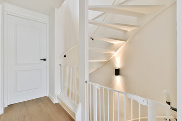 Lovely bright corridor with staircase and beautiful lighting