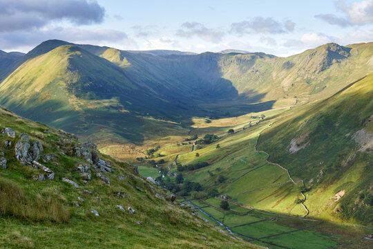 The Nab, Rest Dodd, Brock Crags and Heck Crag in warm sunlight above Bannerdale Beck in Martindale in the English Lake District, England, UK. © Duncan Andison