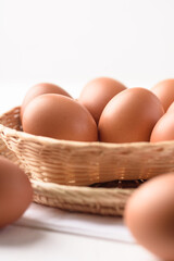Fresh organic chicken eggs on white background.
