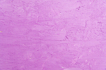 Old wall with peeling stucco. Craquelure purple textured background. Abstract concrete interior