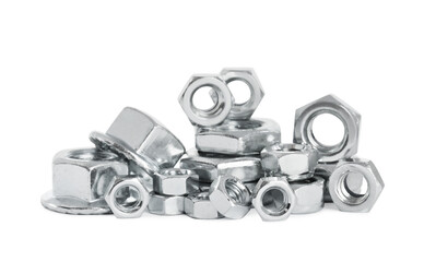 Many different metal nuts on white background