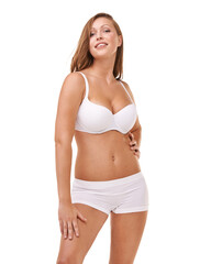 Obraz premium Her confidence is all natural. Full-length portrait of a confident young woman posing in her underwear.