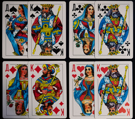 Poker Q K playing cards isolated on black backgroung