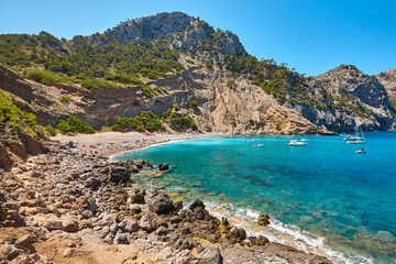 Fototapeta premium Turquoise waters in Mallorca. Coll Baix beach. Mediterranean coastline. Balearic