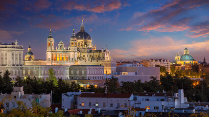 Fototapeta na wymiar Madrid, Spain. Panoramic cityscape image of Madrid skyline with Santa Maria la Real de La Almudena Cathedral and the Royal Palace at twilight. 