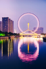 Night scene cityscape of Tianjin ferris wheel,Tianjin eyes in twilight time.Most Modern and popular...