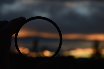 a circle in focus with a view into the distance