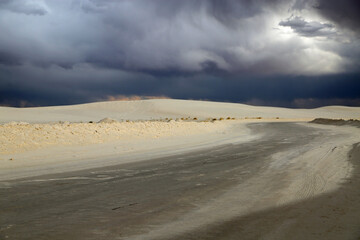 Fototapeta na wymiar The road in white sands NP - White Sands National Park, New Mexico