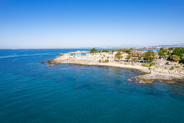 Aerial drone View Of Side Antique City . Side Old Town amphitheater. Side Harbor marina in Antalya Turkey drone photo view