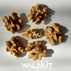 many walnuts are on a white background