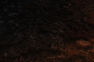 Street covered pebbles on sea coast.Rough uneven little bit fraction grunge marble terrace pathway.Damaged breaking old rustic stone. Scratched shabby grungy granite lava for 3d seaside vintage design