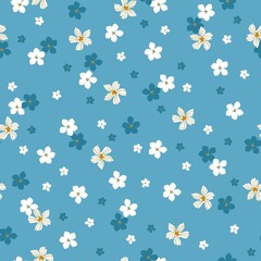 Beautiful vintage pattern. White and blue flowers . Light blue background. Floral seamless background. An elegant template for fashionable prints.