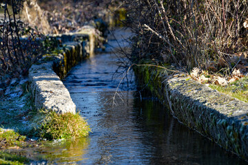 Old water channeling for irrigation and feeding of livestock animals.