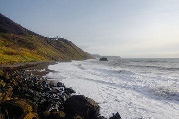 Lighthouse Jonquiere and the coast at sunset