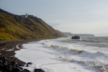 Lighthouse Jonquiere and the coast at sunset