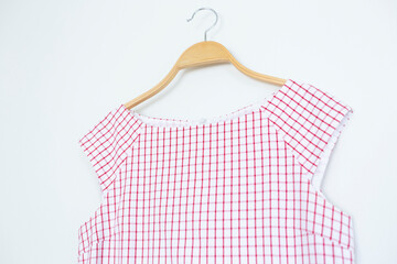 Woman blouse with Pink blouse cotton on white background.