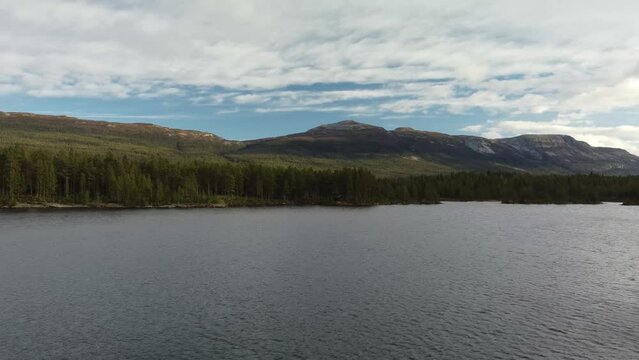 Lake Cabin Nedre Bjorvatn Norway Scenic Mountain Range 4K Drone Shot
