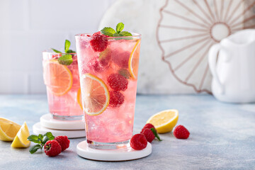 Spring or summer cold cocktail, raspberry lemonade - Powered by Adobe