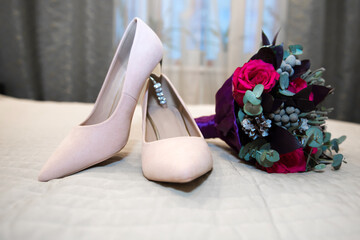 Pink shoes for the bride. Accessories shoes and bridal bouquet for the wedding.