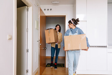 Girlfriends moving in new apartment