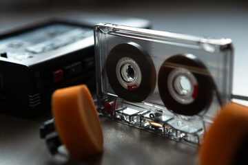 Music listening concept. Vintage cassette tape, audio player and headphones. - 481636536