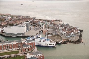 Fototapeta na wymiar Aerial view of a car ferry leaving the harbour of Portsmouth, Hampshire, Southern England