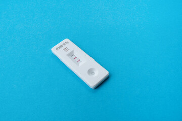 Rapid COVID-19 antigen test. Quick rapid diagnostic test with positive results. Copy space.