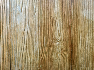 Old brown shera wood panels are patterned like real wood used in the construction of houses. Brown shera wood wall texture use for background.  Fake woods plank texture background with copy space.