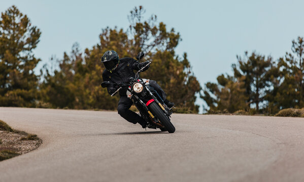 Calar Alto, Spain - May 5th 2021: Man riding a Yamaha XSR700 motorcycle in a beautiful road, during Dunlop Xperience event in Almería, Spain.