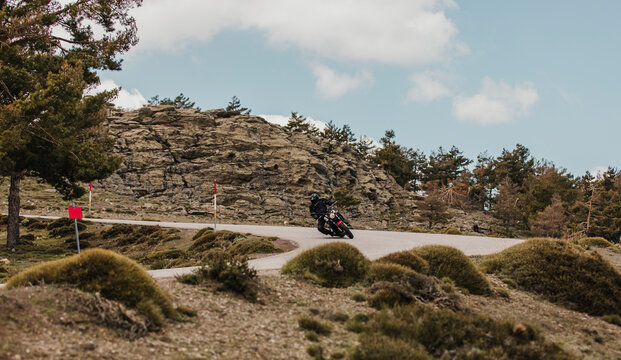 Calar Alto, Spain - May 5th 2021: Man riding a Yamaha XSR700 motorcycle through beautiful landscape, during Dunlop Xperience event in Almería, Spain.