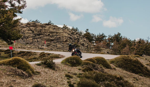 Calar Alto, Spain - May 5th 2021: Man riding a Yamaha XSR700 motorcycle in a high mountain landscape, during Dunlop Xperience event in Almería, Spain.